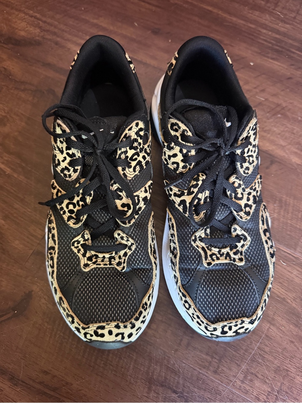 Nike AL8 Women’s Black and Leopard Accent Athletic Sneakers